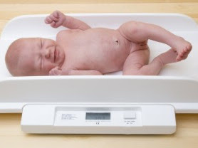 Weighing baby on kitchen scale 170118-Weighing baby on kitchen scale