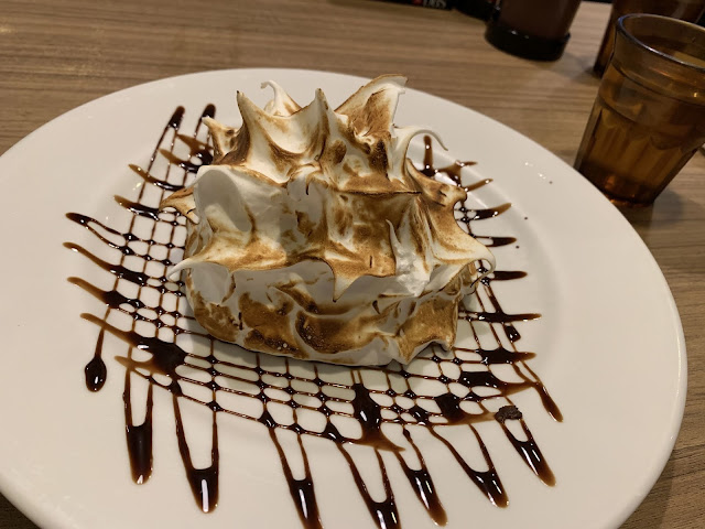 Chocolate ganache, vanilla ice cream, chocolate cake and meringue