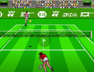 Shows 16 bit Tennis course with two ladys on the screen wearing dress shorts and red and pink shirts in the image and nice amount of green showing on the green plus the yellow colour for the Tennis ball and also some fans in the sitting area on the top level of the game