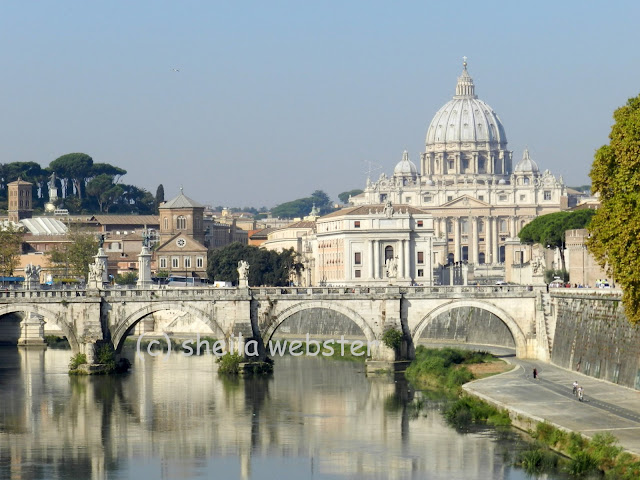 St. Peter's Basilica and the Taber River with bridge crossing.