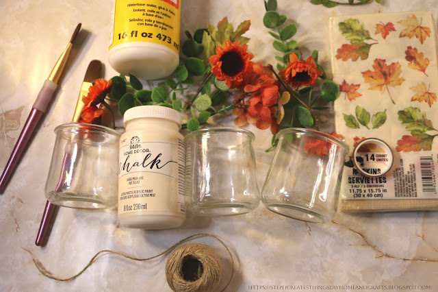 Craft materials are displayed on a table