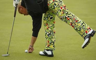 John Daly of the U.S. marks his ball on the sixth green during the second round of the British Open Golf Championship at the Turnberry Golf Club in Scotland, July 17, 2009.<br />REUTERS/Mike Blake (BRITAIN SPORT GOLF) 