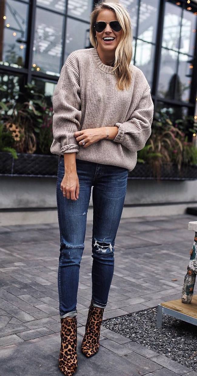 cozy fall outfit / nude oversized sweater + ripped jeans + leopard boots