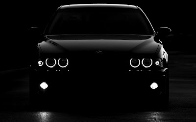 Black BMW Car in Dark Circle Headlights HD Car Wallpaper