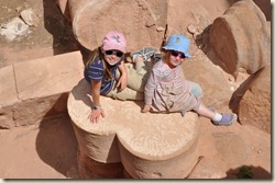 Celine and Lillian sitting on heart column.