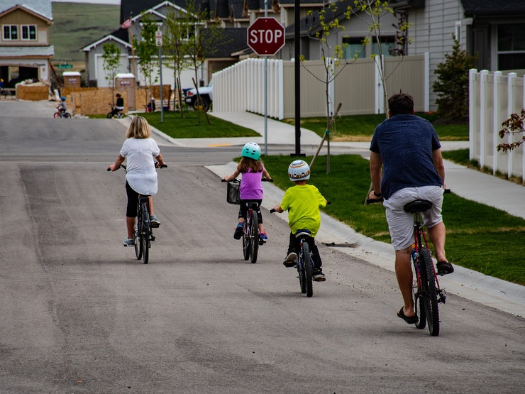 family riding bikes