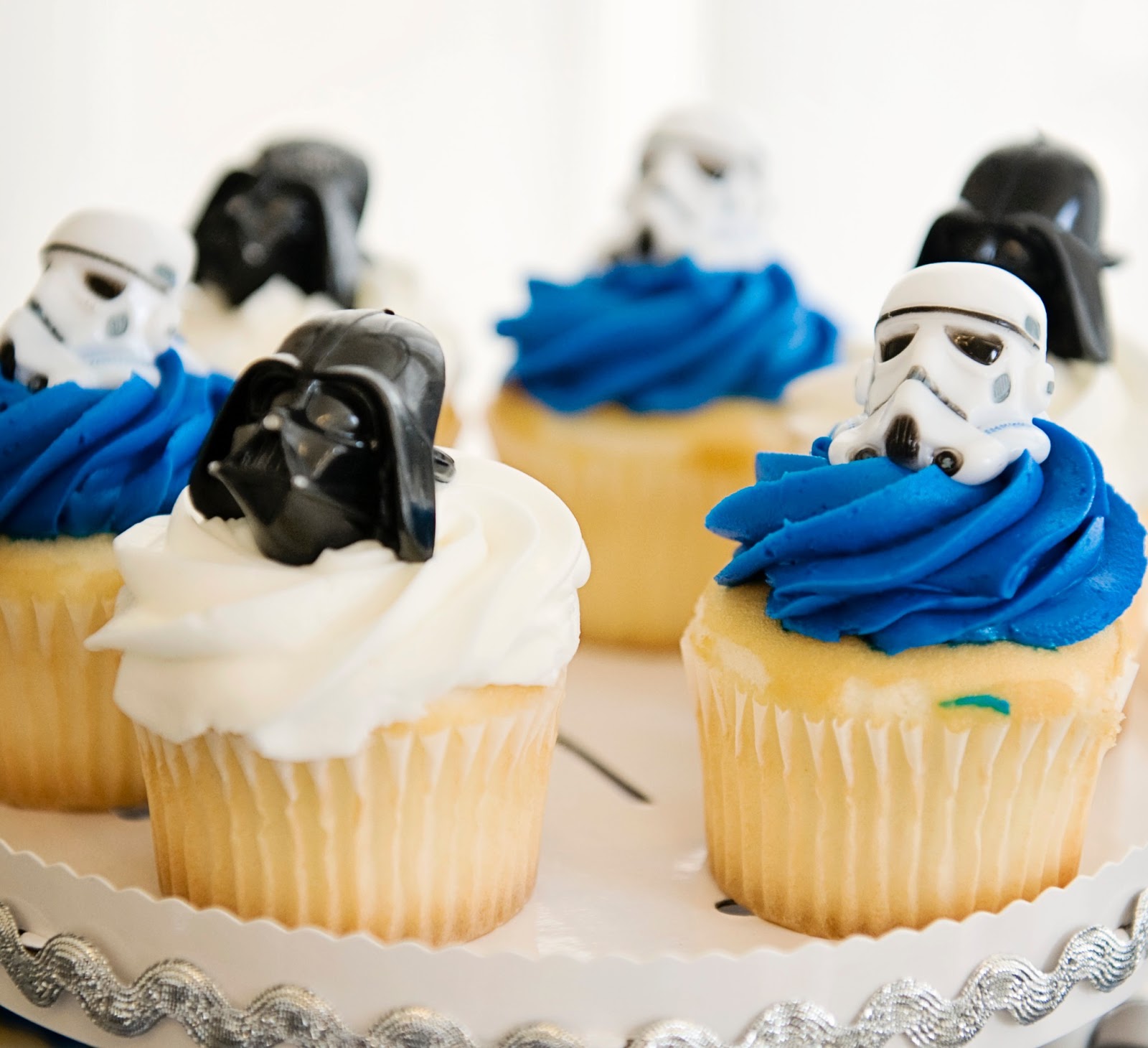 Cupcakes with character rings and cookies were on the dessert table ...