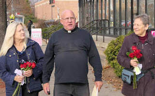 Members of the Red Rose Rescue team: (L to R) Julia Haag, Father Stephen Imbarrato, Joan McKee. Dec. 2, 2017. 