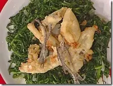 Alici ripiene su nido di agretti