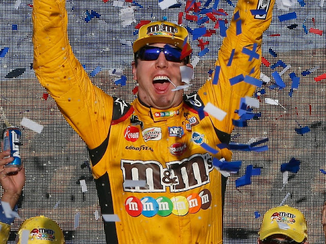 Kyle Bush in M&Ms Endorsement Uniform Celebrates in Confetti