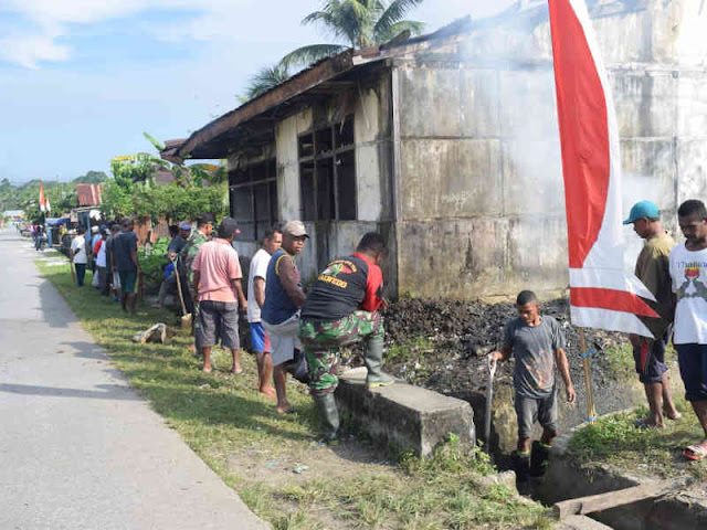 Satgas TMMD Gotong Royong Bersama Warga Yaputi