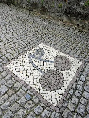 Cherry mosaid sidewalk in Alcongosta Portugal