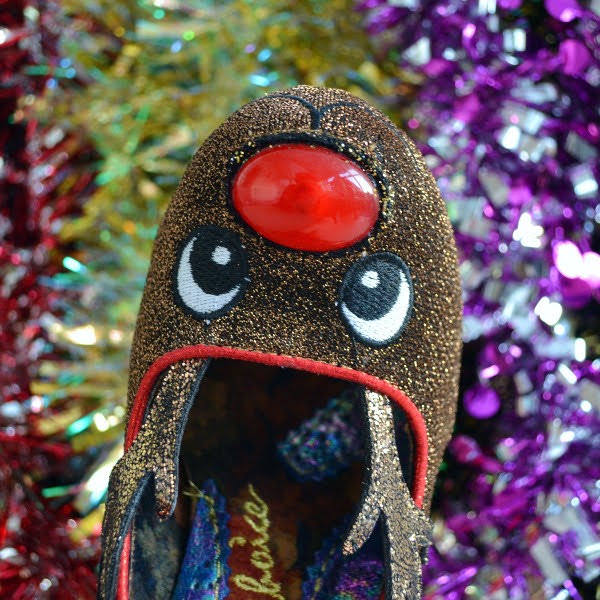 close up of reindeer face on toe of shoe