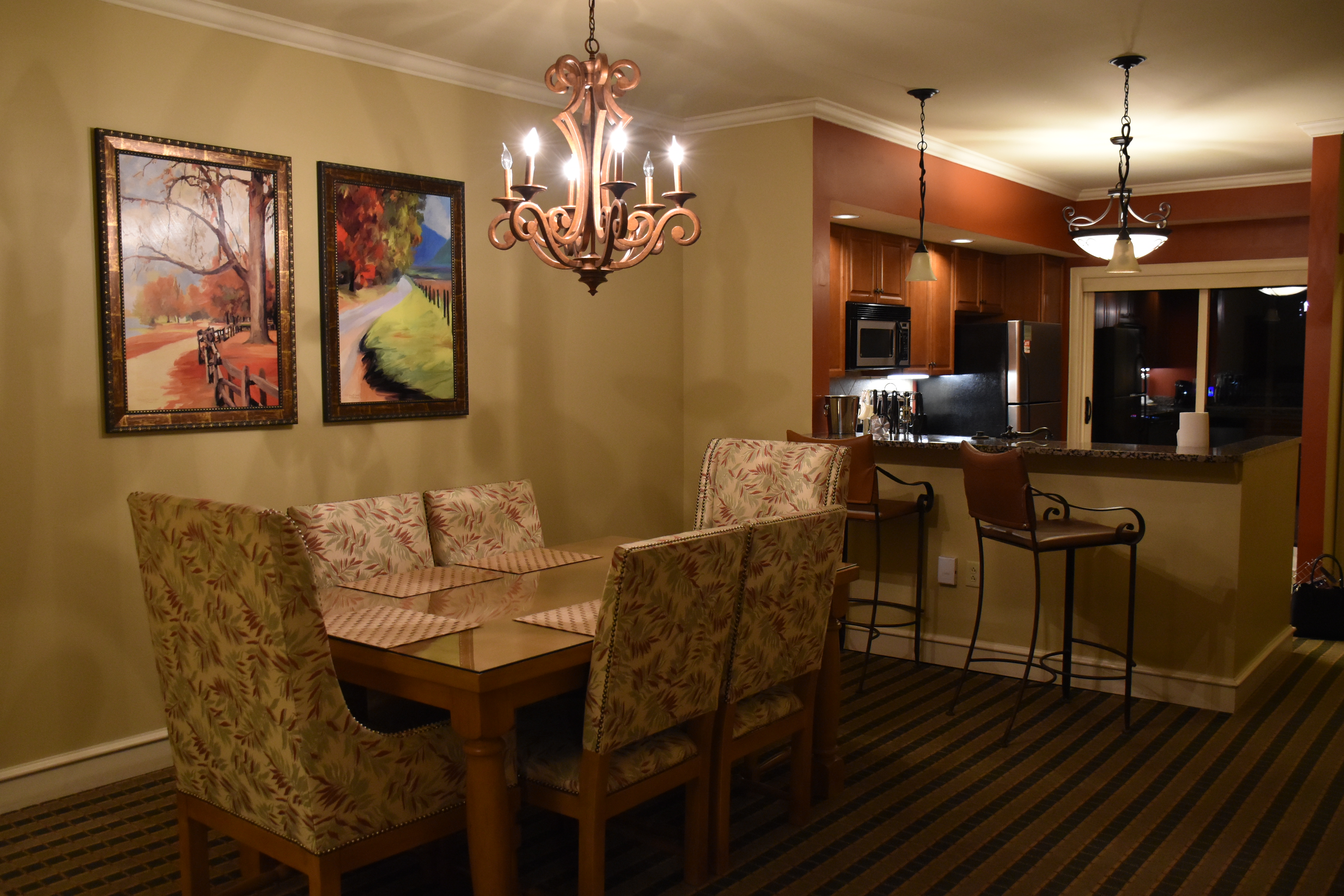 Dining room and Kitchen in condo at Riverstone Resort & Spa