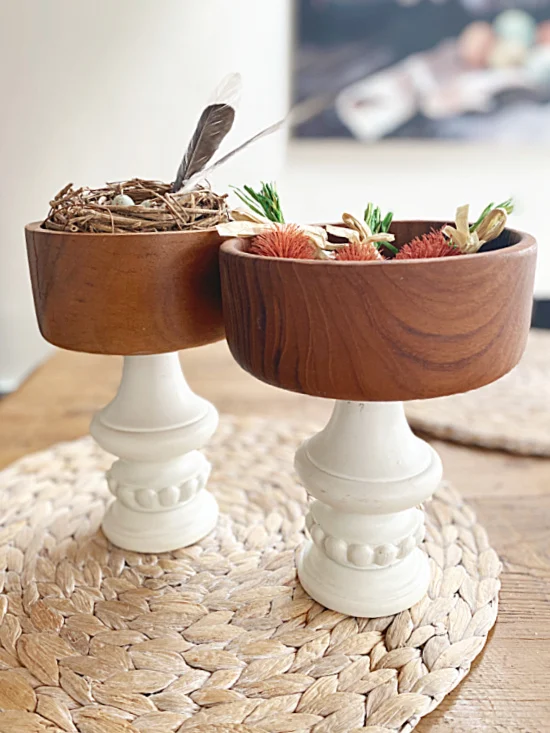 wooden bowls with carrots and nest