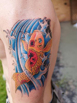 Gold koi fish tattoo swimming in splashing water.