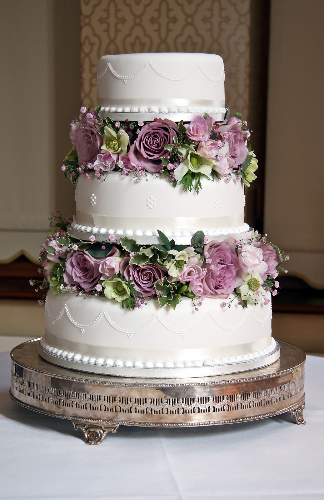 wedding cake with flowers in between the layers. I themed the flowers ...