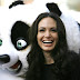 Angelina Jolie poses with a 'Kung Fu Panda'