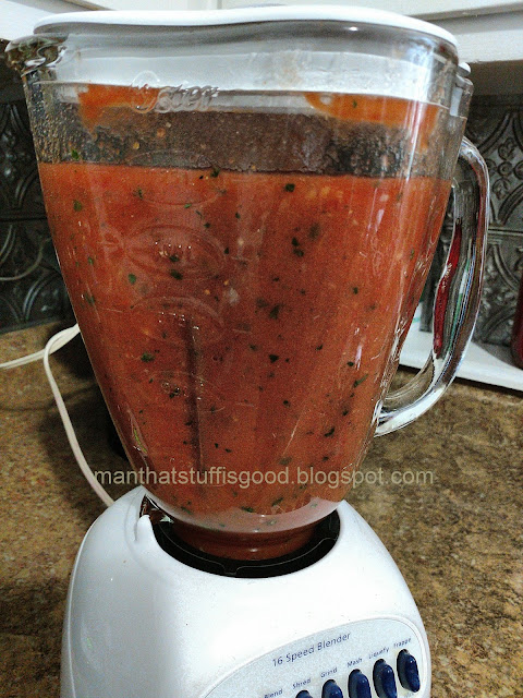 Blender filled with fresh salsa