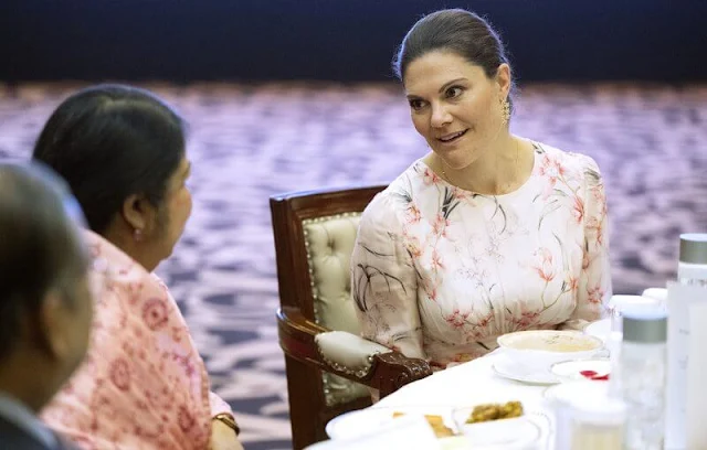 Crown Princess Victoria wore a Meadow romantic orchid silk dress from By Malina. Prime Minister Sheikh Hasina