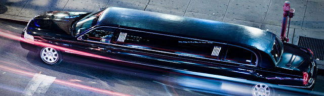 Black Stretch Limousine Parked at the Sidewalk