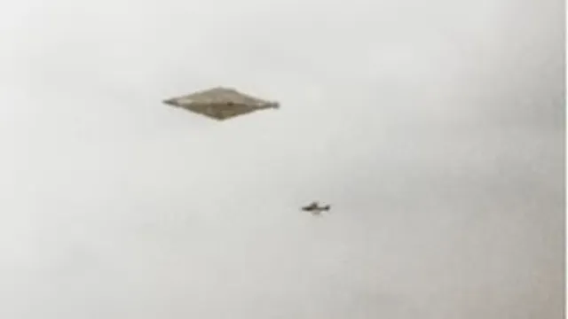 Here's the Craig Lindsay UFO sighting shaped like a Diamond with a RAF Jet chasing it.