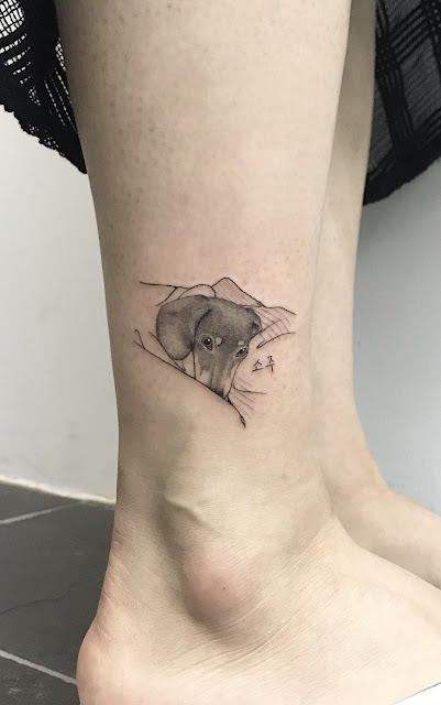 tatuagens femininas de cachorros