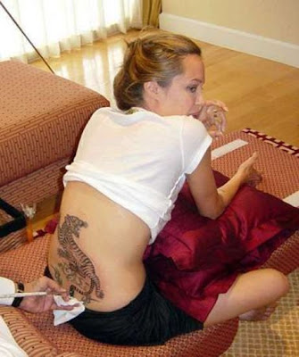 Lower back dragon tattoo