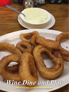 Grits and onion rings at Skyway Jacks in St. Petersburg