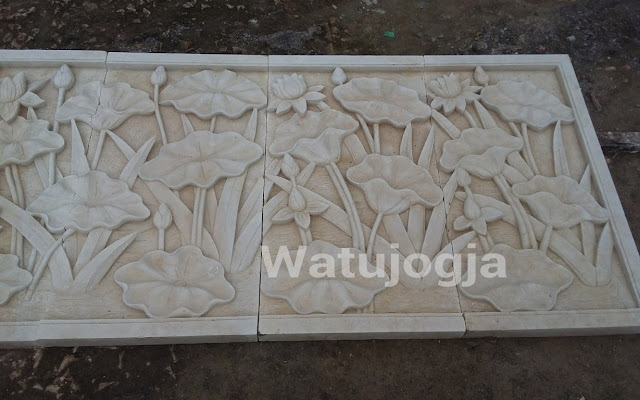 Relief batu alam motif tumbuhan