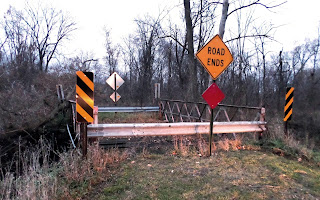 The Powers Highway bridge across Battle Creek, located in Brookfield Township, MI.