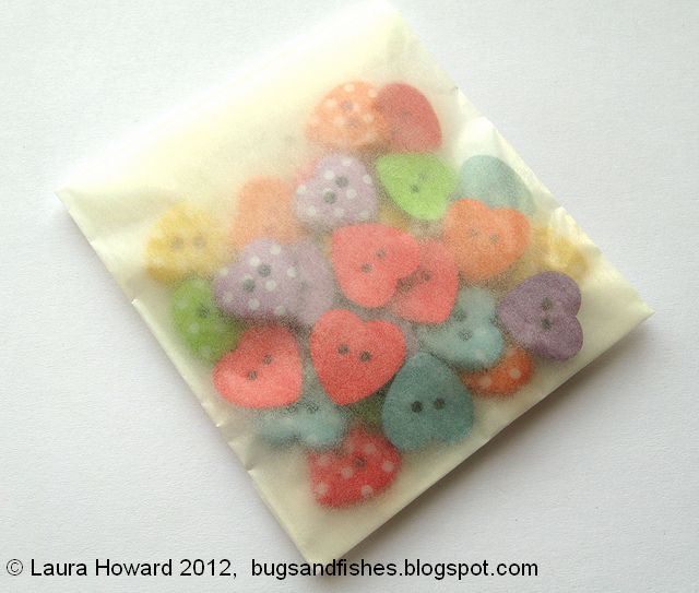 I filled my envelope with cute heartshaped polkadot buttons from Big Fish