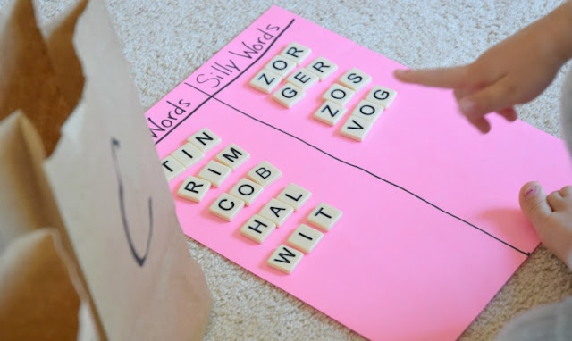 Grab and Sort: CVC Word Building. Fun phonics game for preschoolers or kindergartners using letter tiles to build and sort simple C-V-C words. Great for early readers.