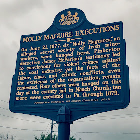 Molly Maguire Executions. On June 21, 1877, six "Molly Maguires," an alleged secret society of Irish mineworkers, were hanged here. Pinkerton detective James McParlan's testimony led to convictions for violent crimes against the coal industry, yet the facts of the labor, class, and ethcnic conflicts, even the existence of the organization, remain contested. Four others were hanged on this day at the county jail in Mauch Chunk; ten more were executed in Pa. through 1879.