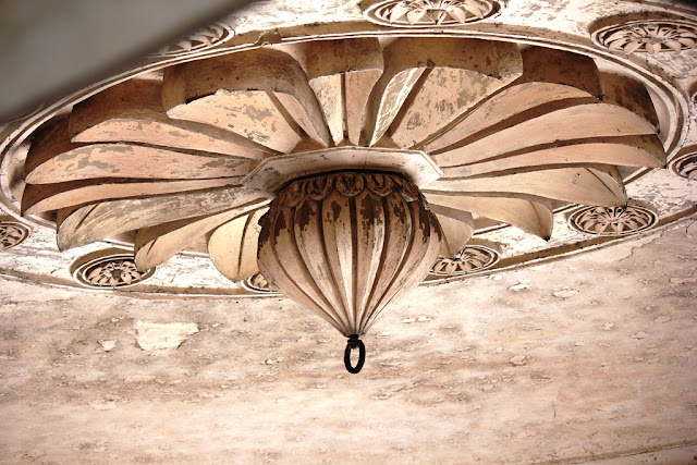 The beautiful Persian stucco worked dome of Charminar - Hyderabad India