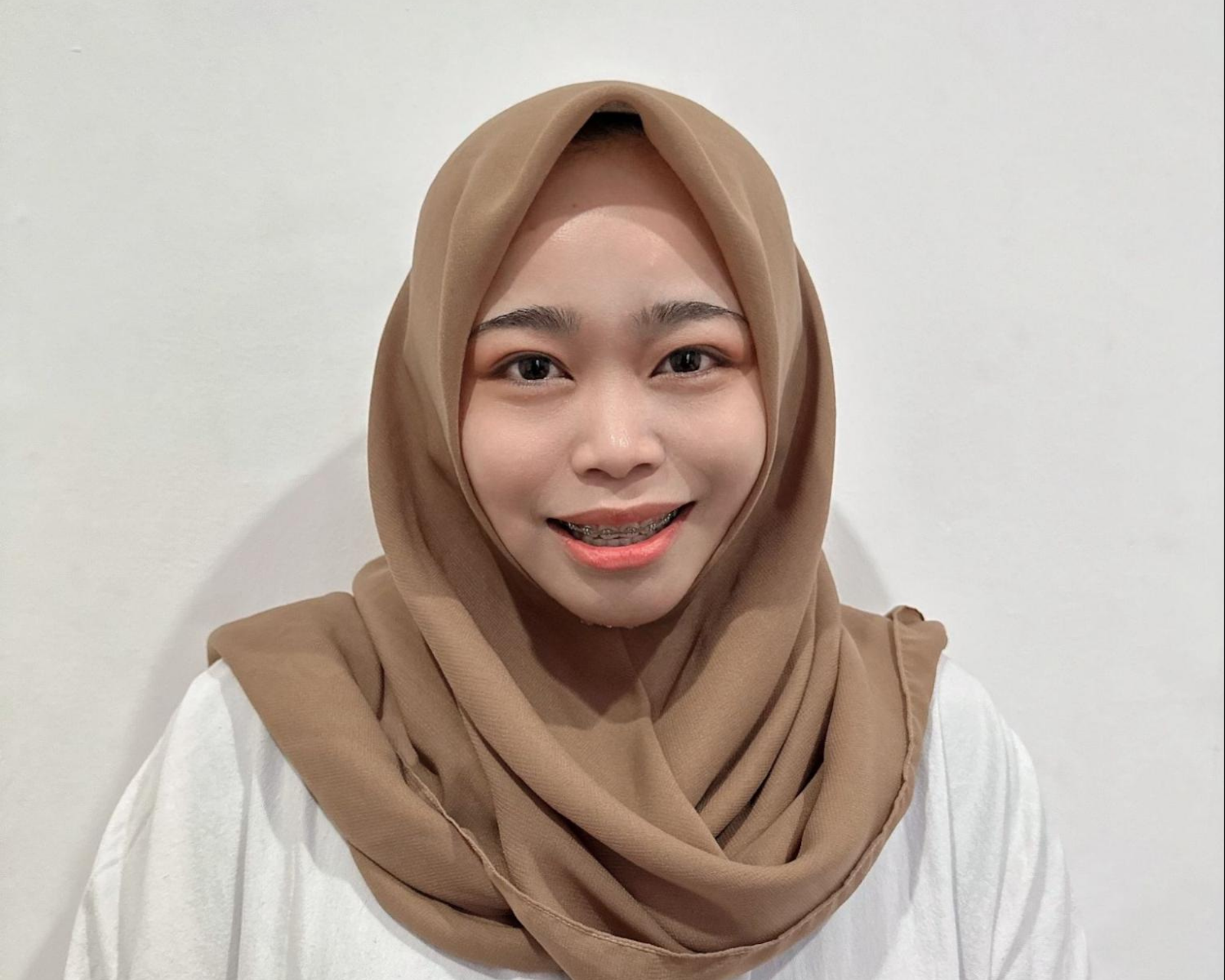 Headshot of Veronica Putri Anggraini, smiling