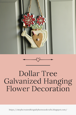 Pinterest pin of Completed galvanized hanging flower decoration along with text