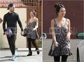 Janel Parrish wearing her Lulu*s Let it Flow Grey Floral Dress