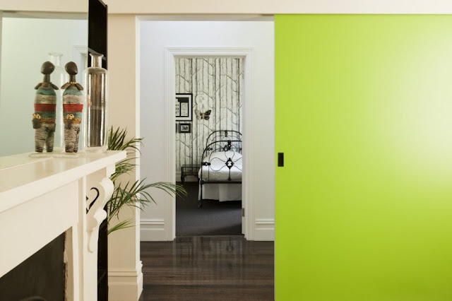 Green and white walls in the hallway