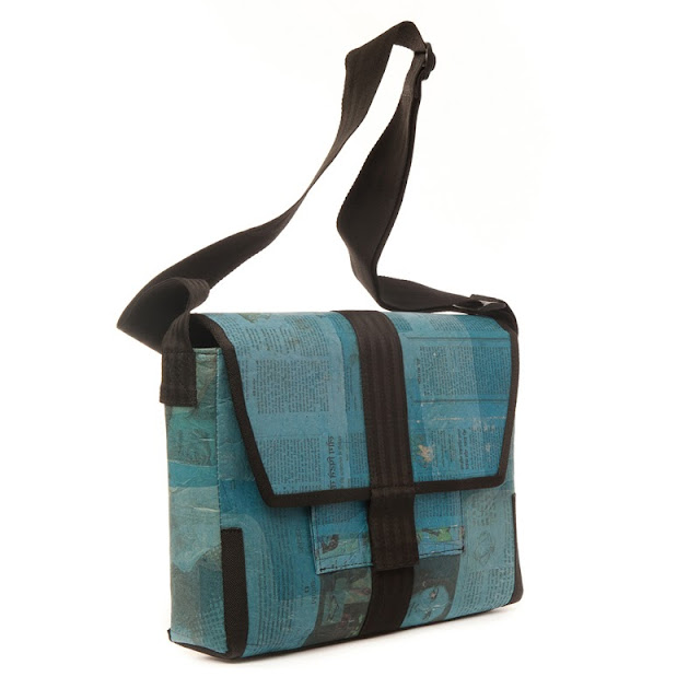 Shoulder bag made from recycled newsprint and seatbelts designed by Alkemi