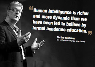 Sir Ken Robinson speaking and pointing his finger