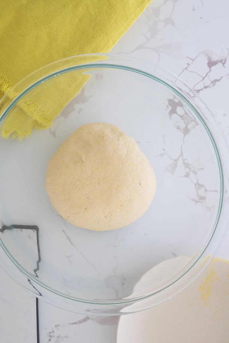 Cornmeal dumpling dough after sitting and ready to portioned to be boiled.