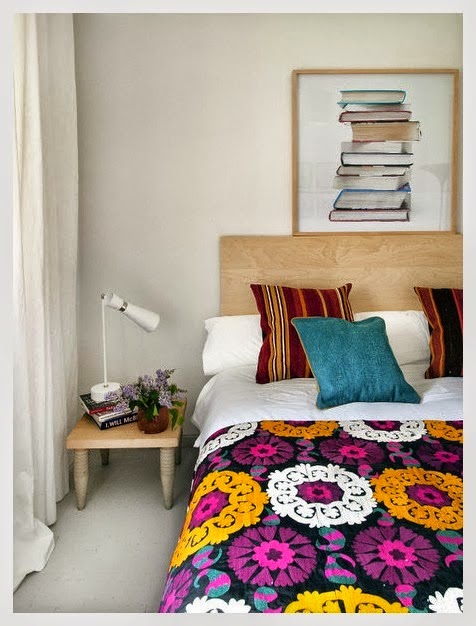 Well for now, it's a peek into an apartment in Madrid. This space would be the perfect answer to my design dilemma. An ideal mix of eclectic textiles