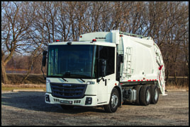 Freightliner EconicSD high cab with McNeilus rear loader body