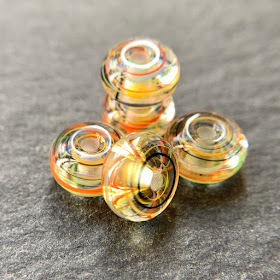 Handmade lampwork glass beads by Laura Sparling made with CiM Circus Tent