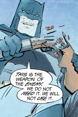 Comic-book panel of Batman saying, as he breaks a rifle in half, 'This is the weapon of the enemy. We do not need it. We will not use it.'