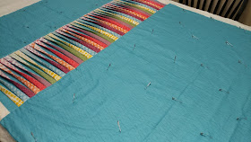 Texture quilt with 3-D twisted strips
