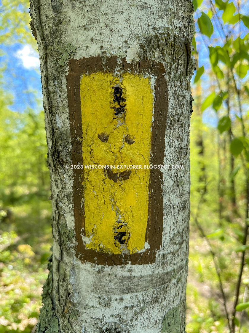 a trailblaze with a smiley face painted on it