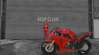 Image en noir et blanc de GTA Online où seule le rouge ressort.
