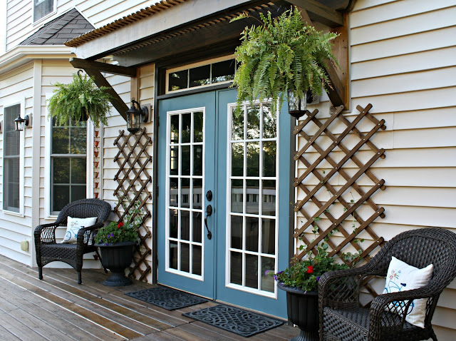 Back door makeover with paint, trellis and new hardware